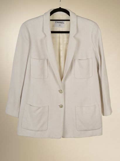 null CHANEL. 
White cotton honeycomb jacket, straight, notched collar, four patch...