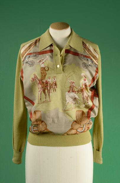 null HERMÈS. 
Pullover in anise green wool and printed silk with bullfighting decoration,...