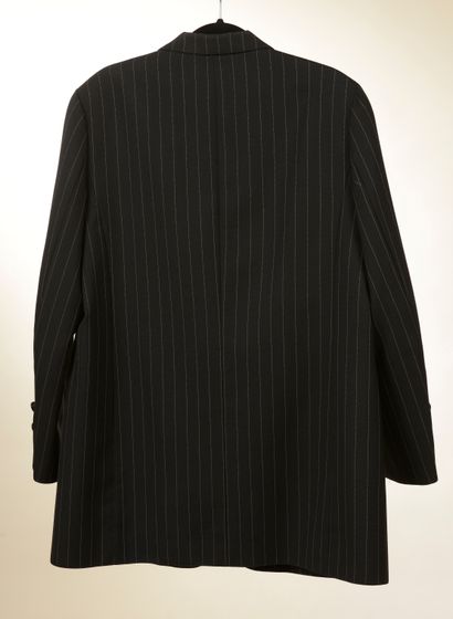 null CHANEL. 
Black wool jacket with fine white stripes, straight and long, notched...