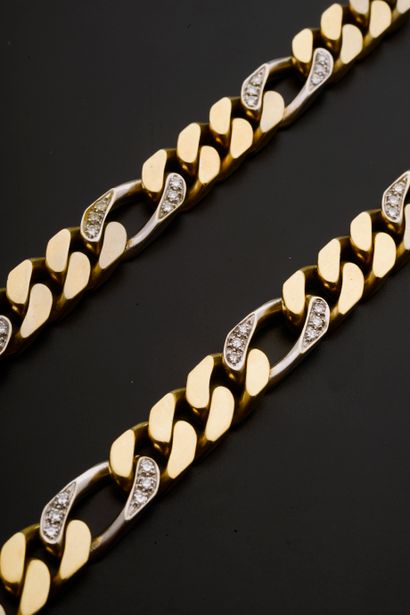 Two necklaces in 18k gold with large curb...