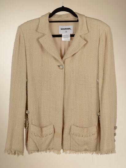 CHANEL. 
Jacket in pinkish beige cotton tweed...