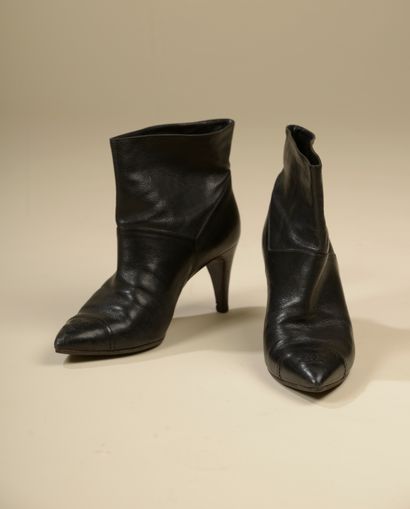 CHANEL. 
Pair of black grained leather ankle...