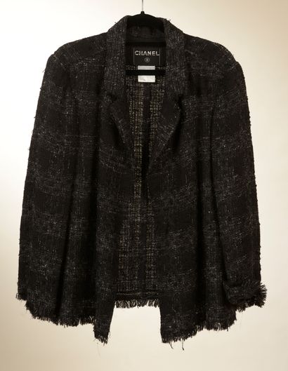 CHANEL. 
Jacket in black and white mottled...