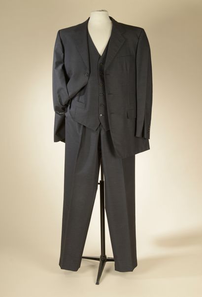 CHRISTIAN DIOR. 
Three-piece suit in gray...