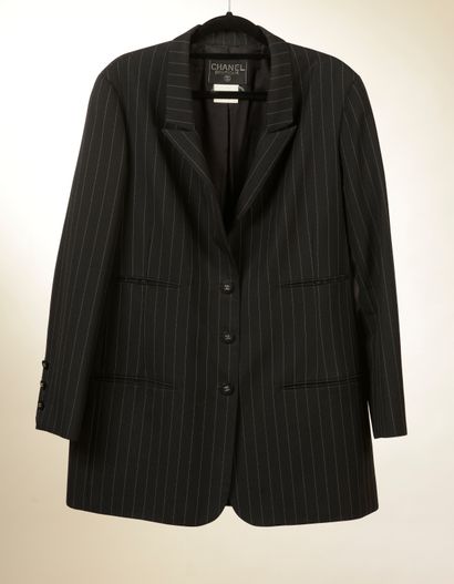 null CHANEL. 
Black wool jacket with fine white stripes, straight and long, notched...