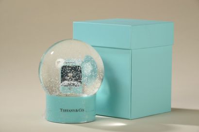 TIFFANY CO. 
Snow globe on a sky blue lacquered...