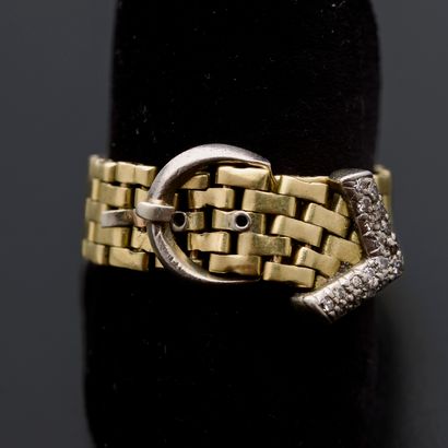 null Belt ring in 18k yellow and white gold, the buckle set with eight-eighths diamonds...