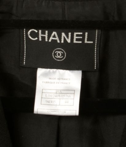 null CHANEL. 
Black wool blend jacket, straight and long, notched collar, four patch...