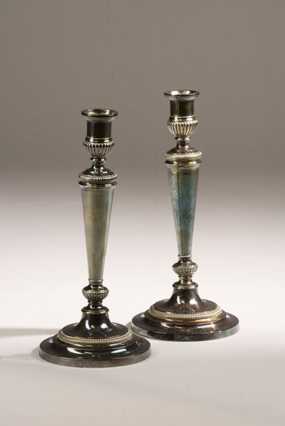 Pair of silver-plated bronze torches with...