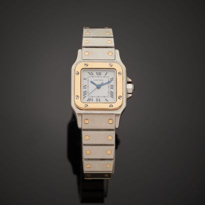 null CARTIER "Santos".
Steel and 18k yellow gold wristwatch, square case, white dial...