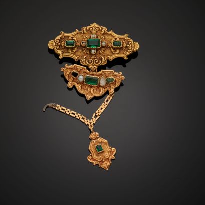 null 18k yellow gold brooch composed of two removable elements punctuated with green...