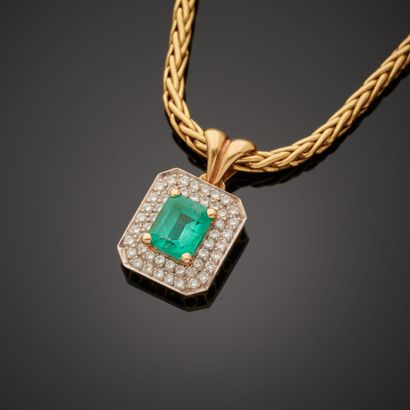 null 18k yellow and white gold rectangular pendant set with an emerald (chips and...