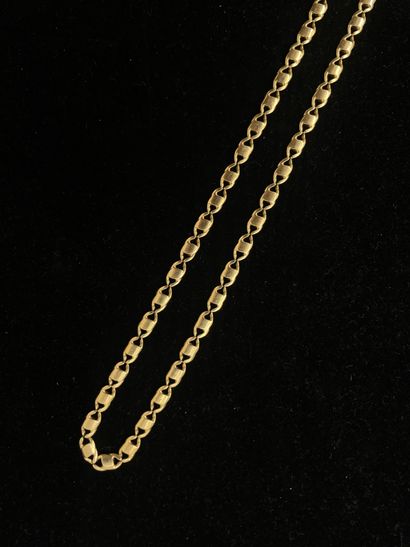 null Necklace in 18k yellow gold with flat figaro link, the clasp with snap hook....