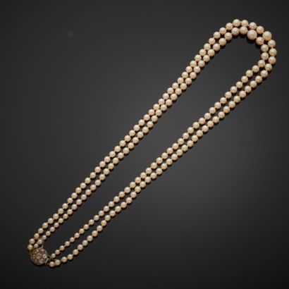 null Necklace composed of two rows of cultured pearls, the clasp in 18k yellow and...