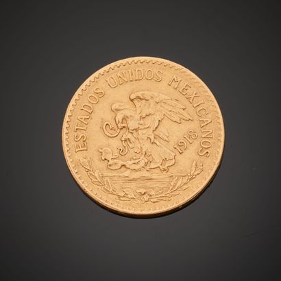 null Pièce en or de 20 Pesos mexicains datant de 1918.
Diam. : 2,7 cm - Poids : 16,2...