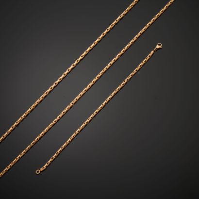 null Set consisting of two necklace chains and a bracelet in 18k yellow gold with...