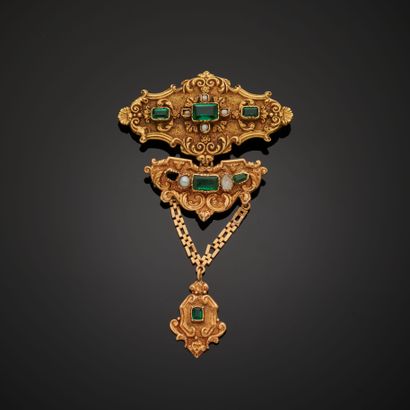 null 18k yellow gold brooch composed of two removable elements punctuated with green...
