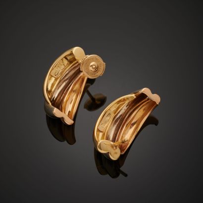 null FRED.
Pair of 18k gold earrings designed with three three-tone gold rings, Alpa...