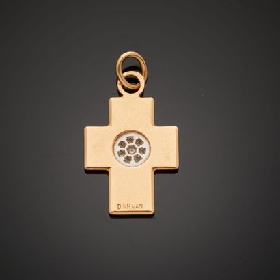 null DINH VAN.
Cross pendant in 18k yellow gold and 850 thousandths platinum with...