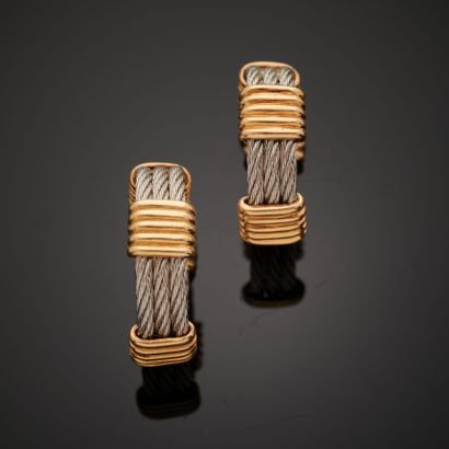 null FRED "Force 10".
Paire de clips d'oreilles en acier torsadé et or jaune 18k.
Signée...