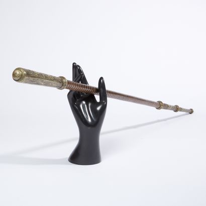 Cane.
Long metal knob engraved with oriental...