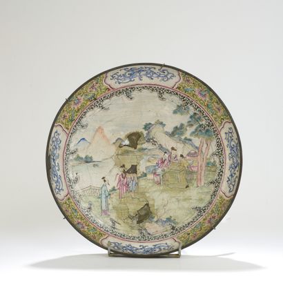 null CHINA.
A copper and painted enamel dish decorated with go-playing scholars on...