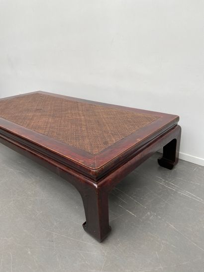 null CHINA.
Varnished exotic wood opium smoker's bed, the top trimmed with caning,...