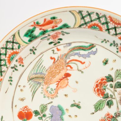 null CHINA.
Two plates forming a pair in green family polychrome enameled porcelain...