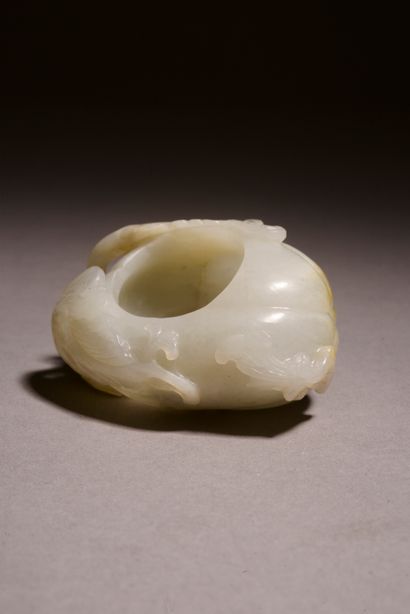 null CHINA.
Celadon jade (nephrite) group in the form of two goats lying side by...