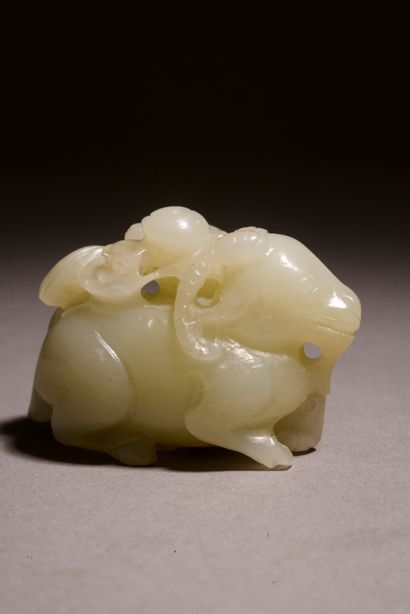 null CHINA.
Celadon jade (nephrite) group in the form of two goats lying side by...