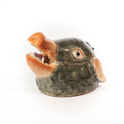null CHINA. 
Porcelain tureen in the shape of a boar's head, polychrome enameled...