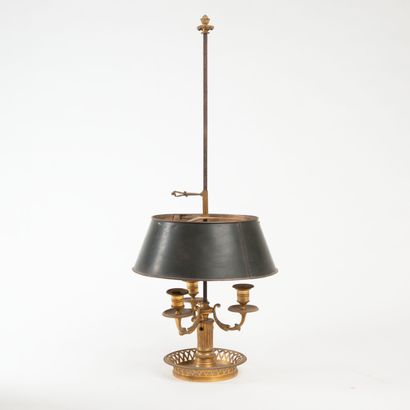 null Hot-water bottle lamp in chased and gilded bronze, openwork rim, three-light...