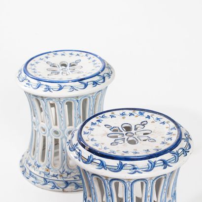 null Pair of enameled openwork earthenware stools decorated with blue and yellow...