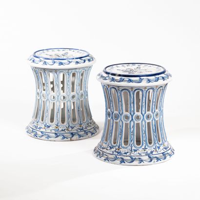 null Pair of enameled openwork earthenware stools decorated with blue and yellow...