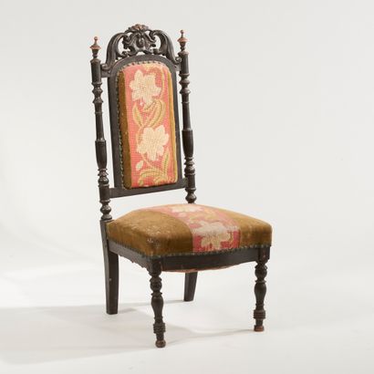null Blackened carved wood chaise lounge, openwork back, detached baluster-shaped...