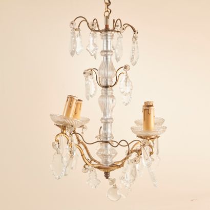 null Small chandelier in metal and molded and pressed glass with four lights and...