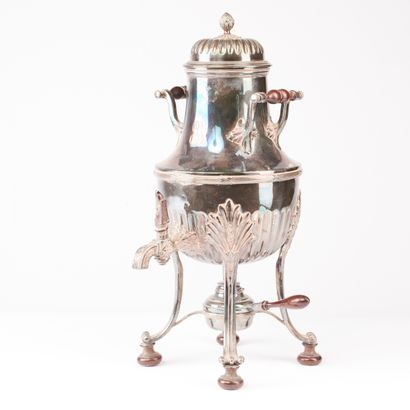 null Silver-plated baluster-shaped samovar, resting on four legs attached by parsley...