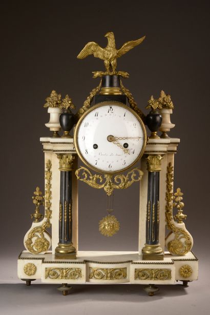 null Portico calendar clock in white marble, black marble and rich ornamentation...