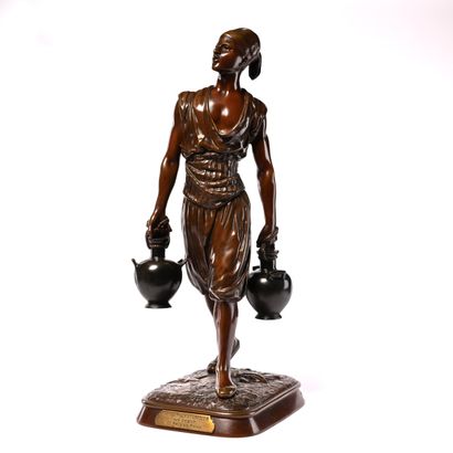 null Marcel DEBUT (1865-1933).

"The Tunisian water carrier".

Bronze with brown...