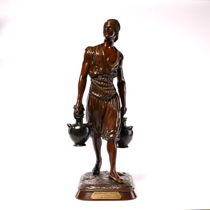 null Marcel DEBUT (1865-1933).

"The Tunisian water carrier".

Bronze with brown...