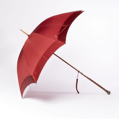 null Umbrella. 

English silver knob, square-section rosewood shaft, purple silk,...
