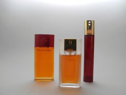 null CARTIER, "Must", trois flacons de parfum dont deux 50 ml et un 25 ml. 