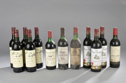 null Ensemble de 12 bouteilles : 2 bouteilles Pomerol 1 de 1966 (LB) et 1 de 1983...