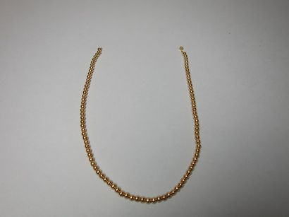 null RAS DE COU à perles d'or 18K enfilées. Fermoir mousqueton.
Long.: 42 cm - Poids:...