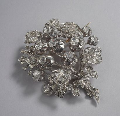 null BROCHE fleur en or 18K et argent 925 millièmes ajourés, entièrement sertie de...