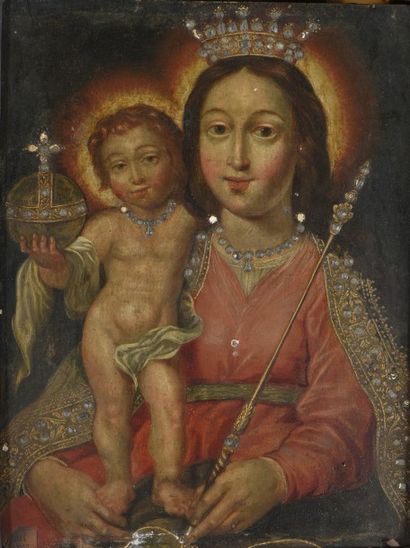 ECOLE DU XVIIe SIÈCLE Vierge à l'Enfant.
Huile sur panneau de chêne, les ornements...