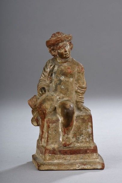 null Statuette représentant un jeune garçon nu, les épaules couvertes d'un drapé,...