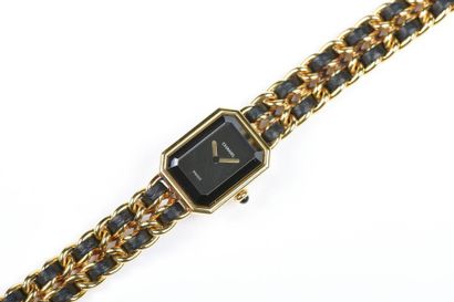 null CHANEL. Montre bracelet de dame, modèle "Première", en métal plaqué or, cadran...
