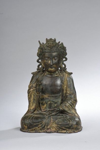 Statue de bodhisattva en bronze doré (manques).
Hauteur...