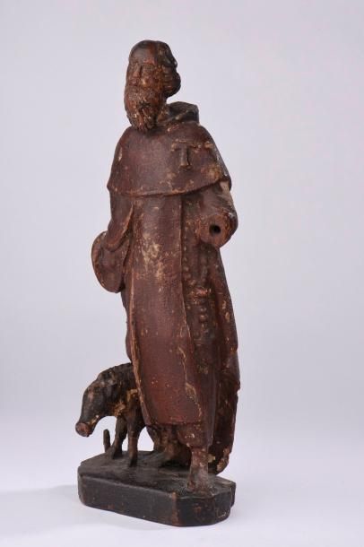 null École du XVIIème siècle. / Saint-Antoine et son cochon en bois sculpté polychrome...